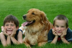 a family pictures 2 children within a dog