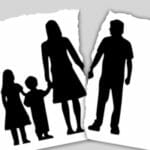 Family silhouette being torn in half | Naperville Divorce Attorney