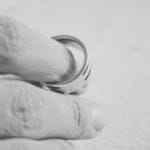 wedding ring on a finger
